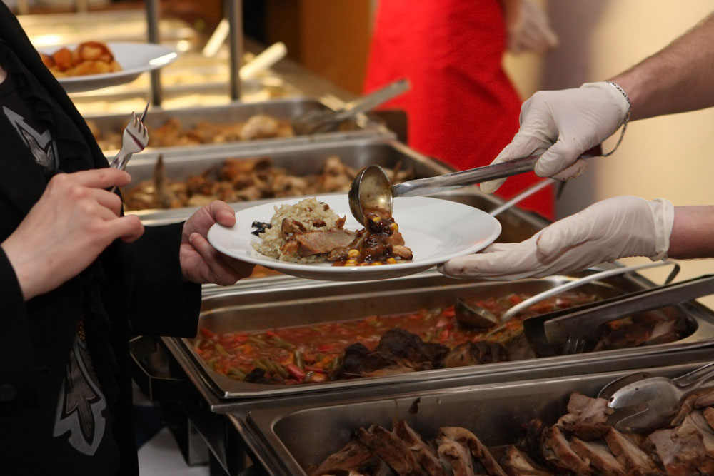 Caterer Serving Food To Guest - Catering in Washington D.C.